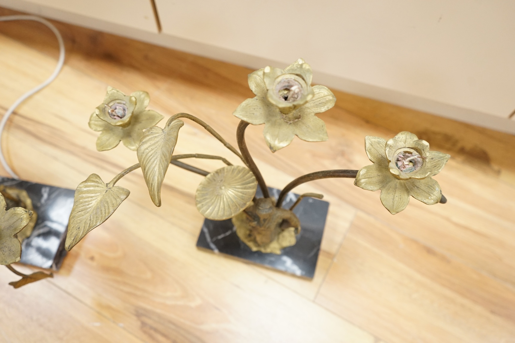 A pair of gilt metal and marble figural converted lamps, 38cm